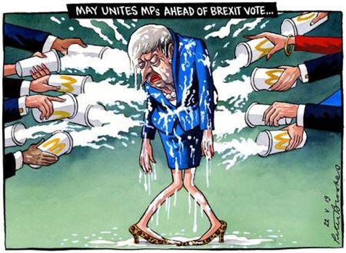 vignetta con Theresa May colpita inondata da una decina di frappé. Didascalia: May unites MPs ahead of Brexit Vote